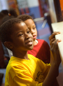 Two elementary school children in bright colored shirts